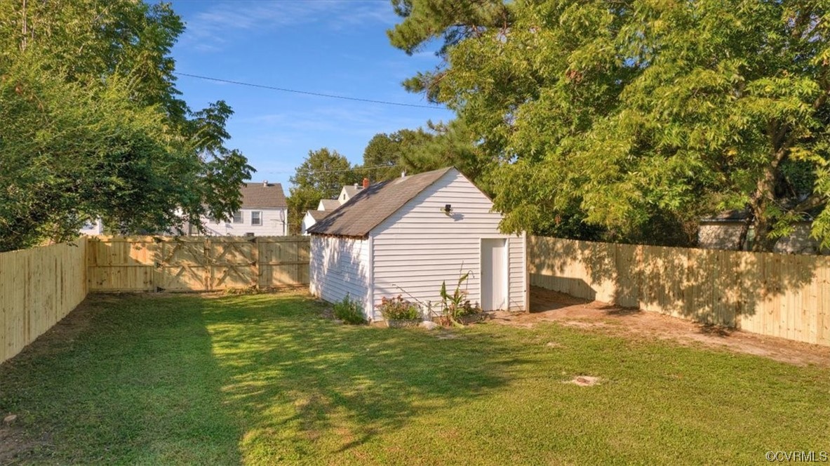 2309 Wright Avenue Richmond, VA 23224 - Photo 31 of 39 a view of a backyard with large trees