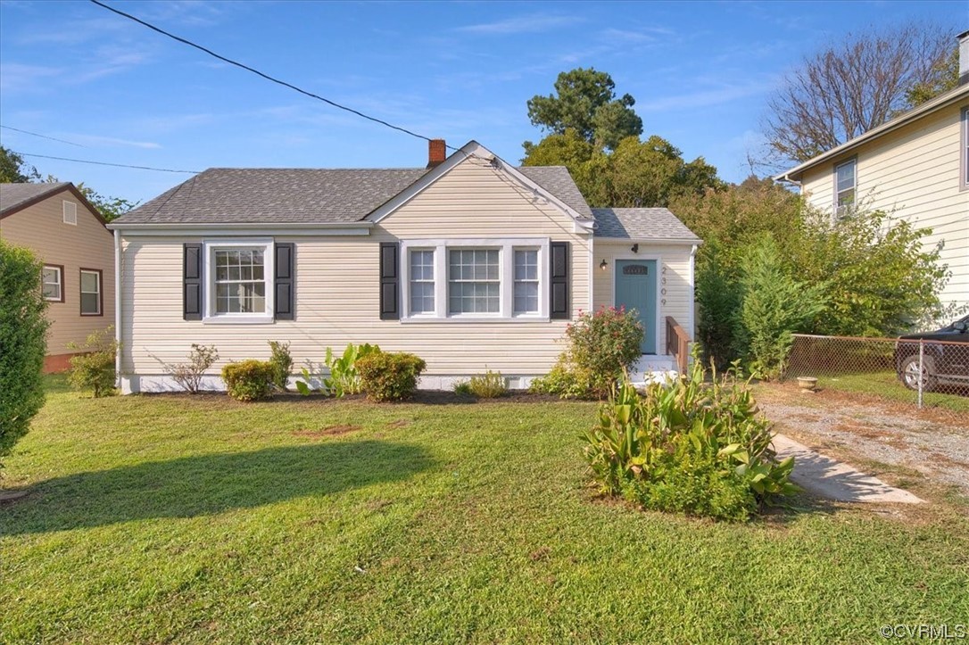 2309 Wright Avenue Richmond, VA 23224 - Photo 35 of 39 a front view of a house with a yard