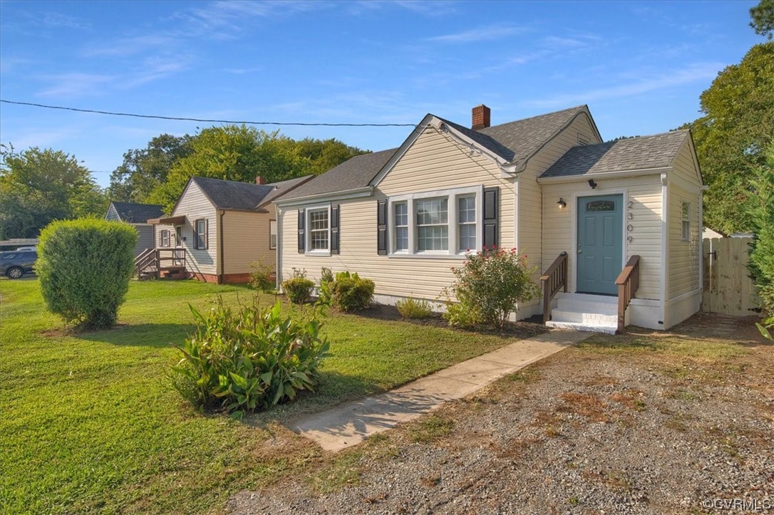 2309 Wright Avenue Richmond, VA 23224 - Photo 36 of 39 a view of a house with backyard and garden
