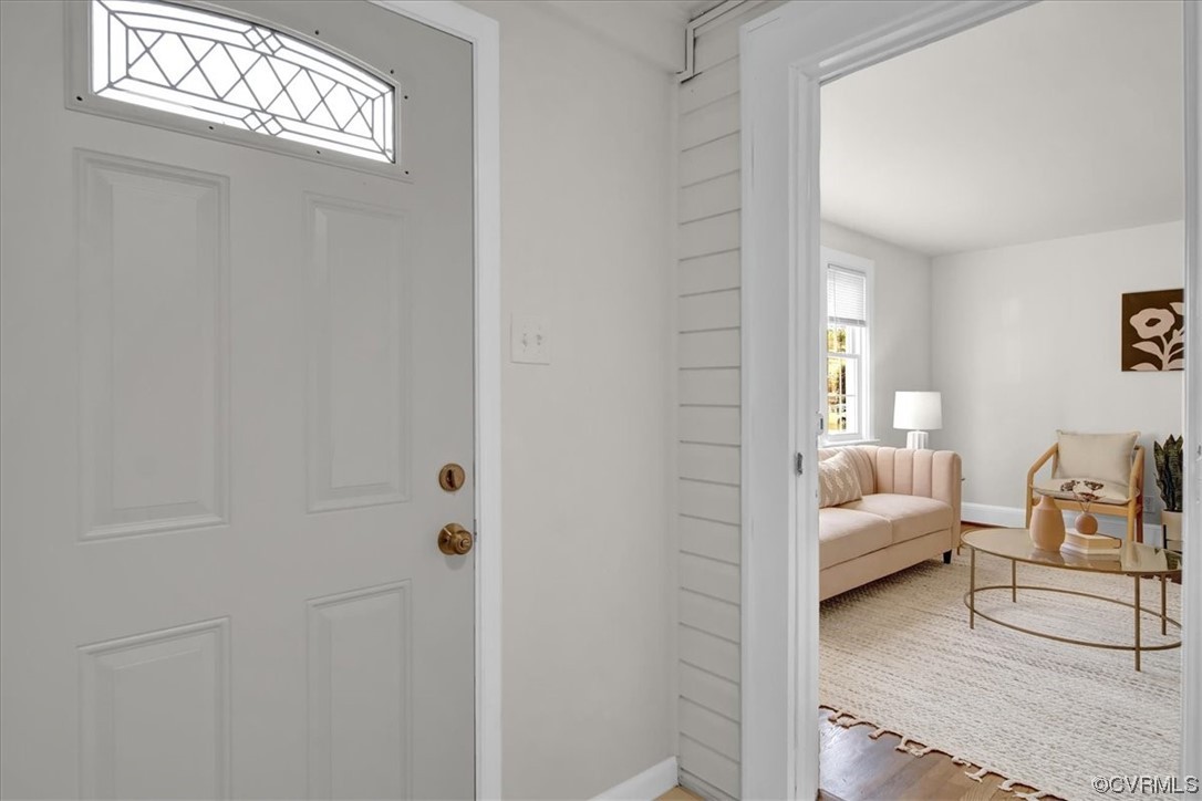 2309 Wright Avenue Richmond, VA 23224 - Photo 6 of 39 a bedroom with a bed and a couch