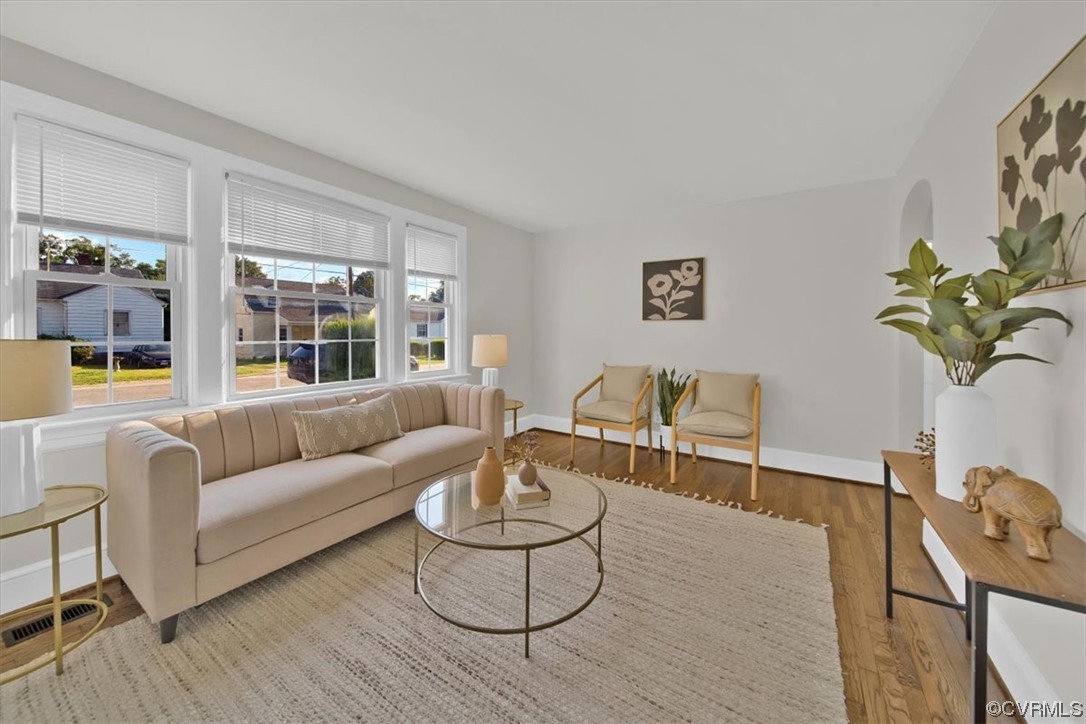 2309 Wright Avenue Richmond, VA 23224 - Photo 8 of 39 a living room with furniture and a potted plant