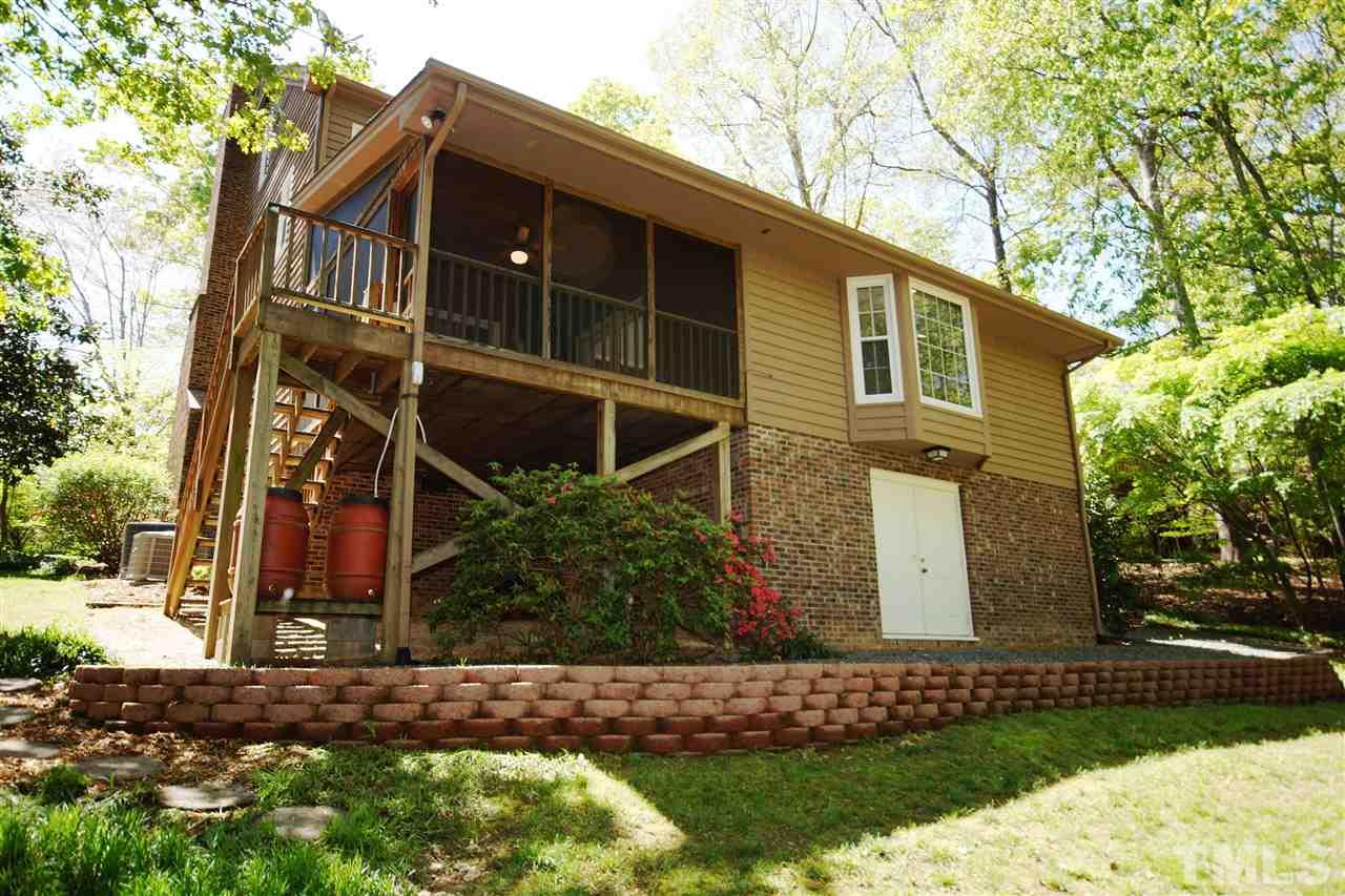 5012 Trail Ridge Drive Raleigh, NC 27613 - Photo 22 of 25 a front view of a house with garden