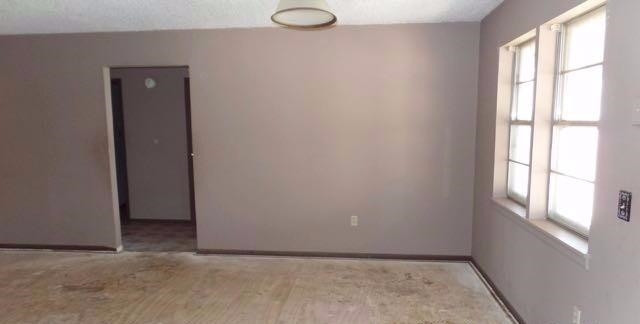 1506 Ave O Ralls, TX 79357 - Photo 5 of 10 an empty room with windows