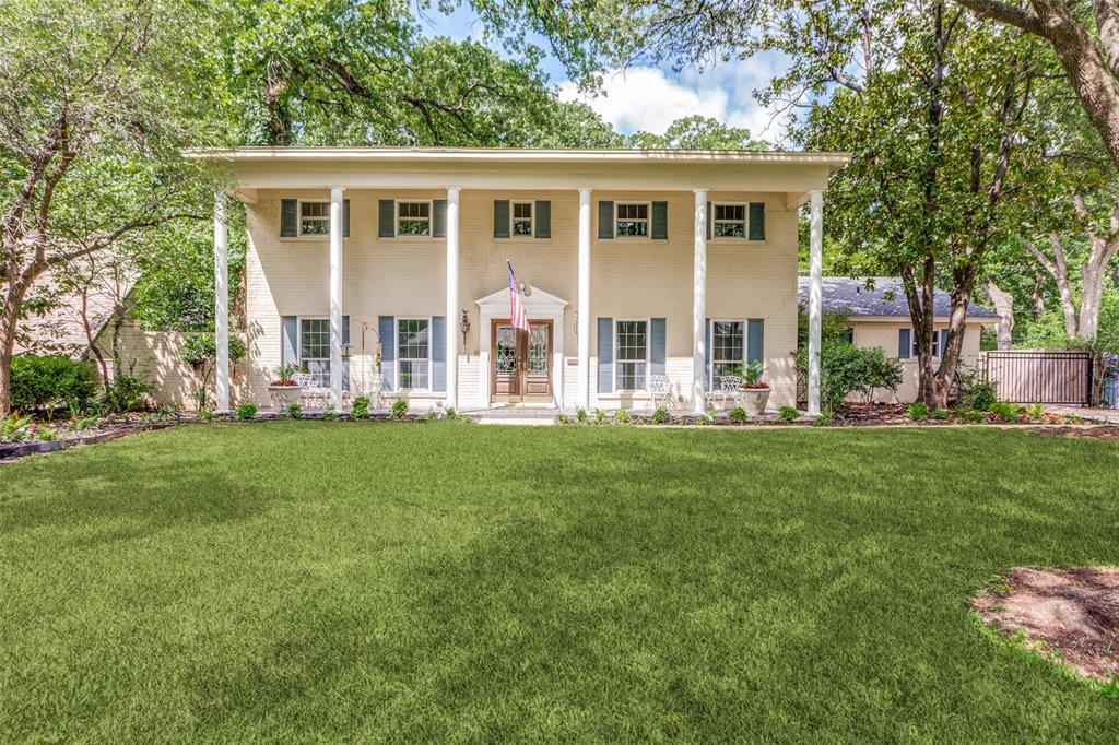4316 Springbranch Drive Benbrook, TX 76116 - Photo 1 of 39 Traditional two-story facade with a portico entry and white columns
