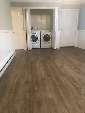 a view of a storage & utility room with washer and dryer