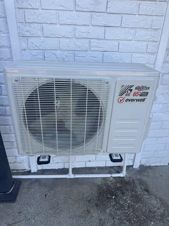 a front view of a house with a empty space