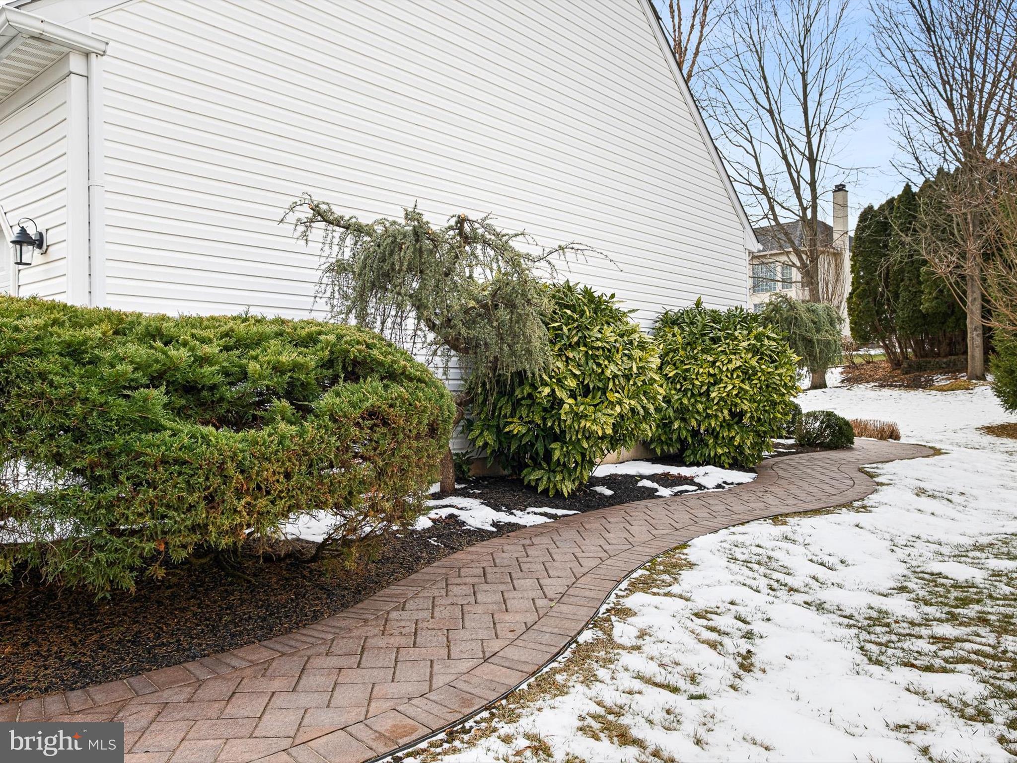 604 Oriole Place Hockessin, DE 19707 - Photo 2 of 40 a view of a backyard with pathway