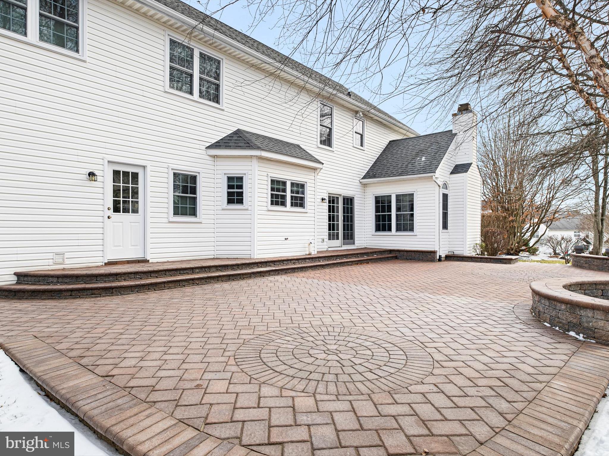 604 Oriole Place Hockessin, DE 19707 - Photo 21 of 40 a front view of a house with a yard