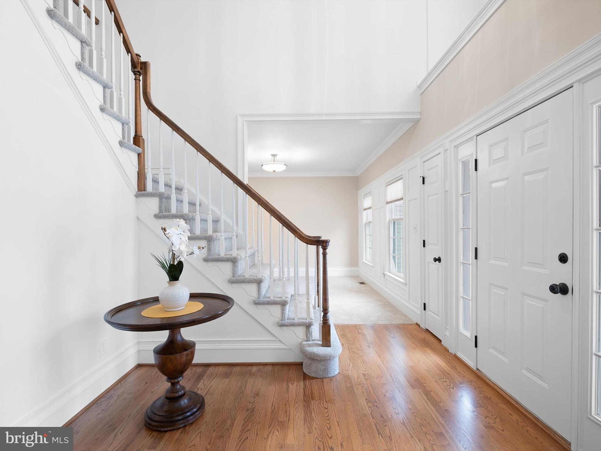 604 Oriole Place Hockessin, DE 19707 - Photo 3 of 40 a view of entryway with wooden floor and front door