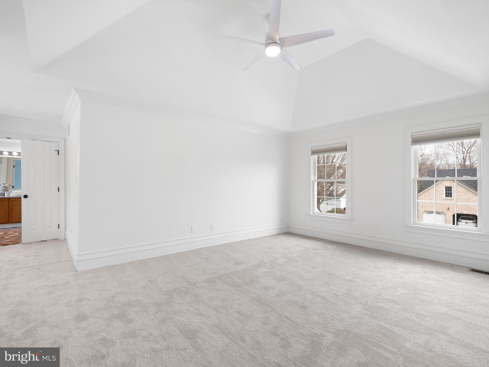 604 Oriole Place Hockessin, DE 19707 - Photo 32 of 40 an empty room with a empty space and windows