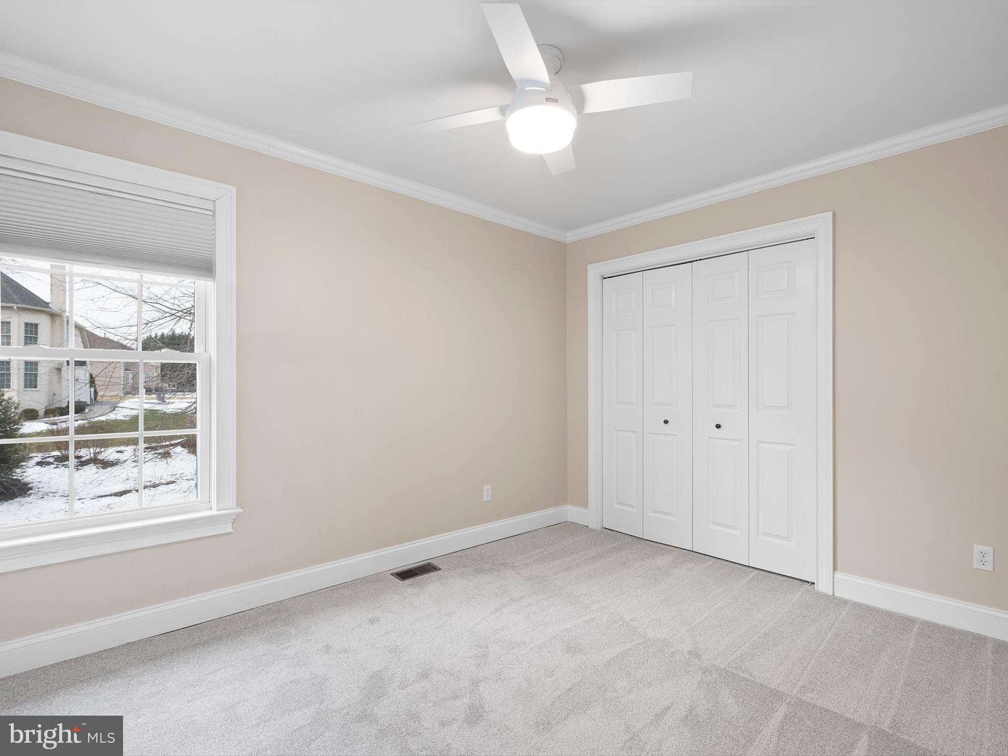 604 Oriole Place Hockessin, DE 19707 - Photo 34 of 40 a view of an empty room with a window