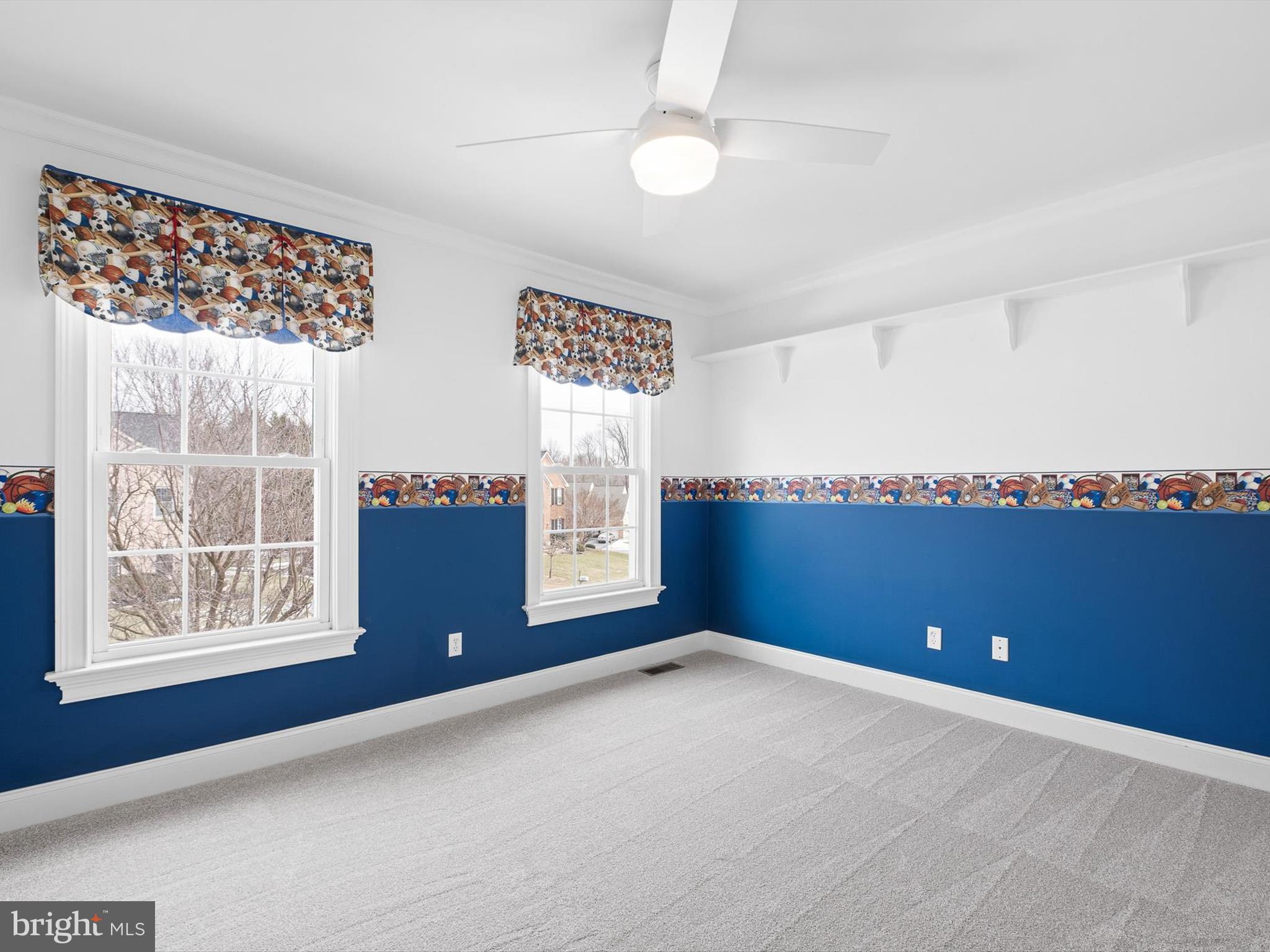 604 Oriole Place Hockessin, DE 19707 - Photo 35 of 40 a view of an empty room with a window and kitchen