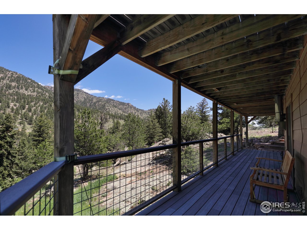 187 Wichita Road Lyons, CO 80540 - Photo 22 of 47 a view of balcony with wooden floor