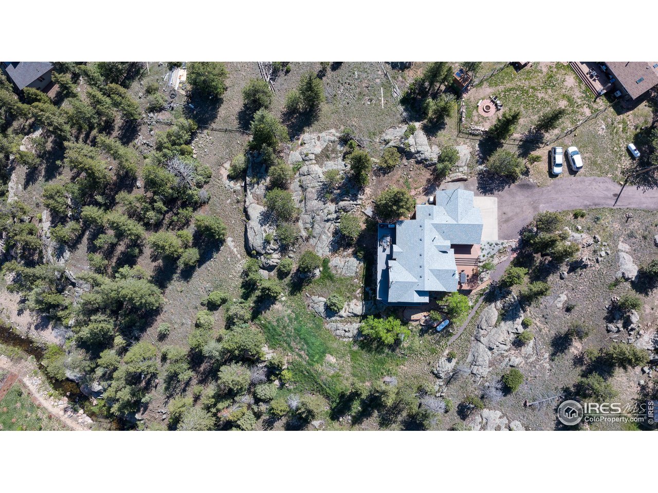 187 Wichita Road Lyons, CO 80540 - Photo 36 of 47 a black and white photo of a house