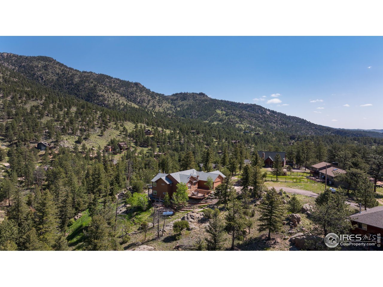 187 Wichita Road Lyons, CO 80540 - Photo 37 of 47 a black and white photo of a mountain