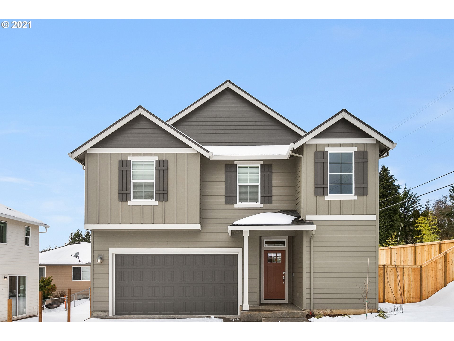 a front view of a house with yard