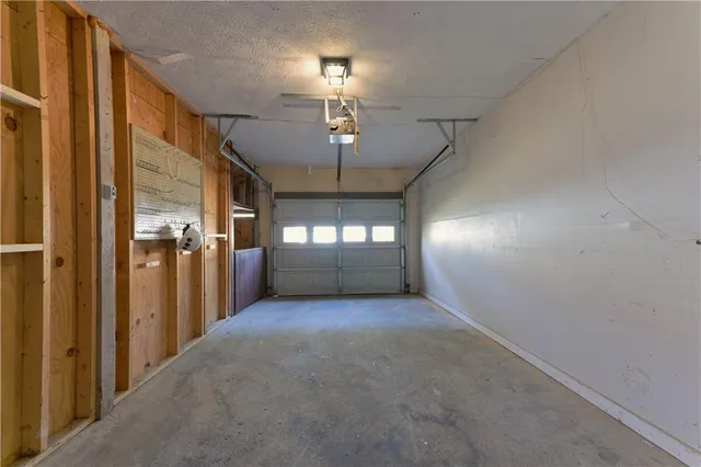 a view of a hallway with chandelier