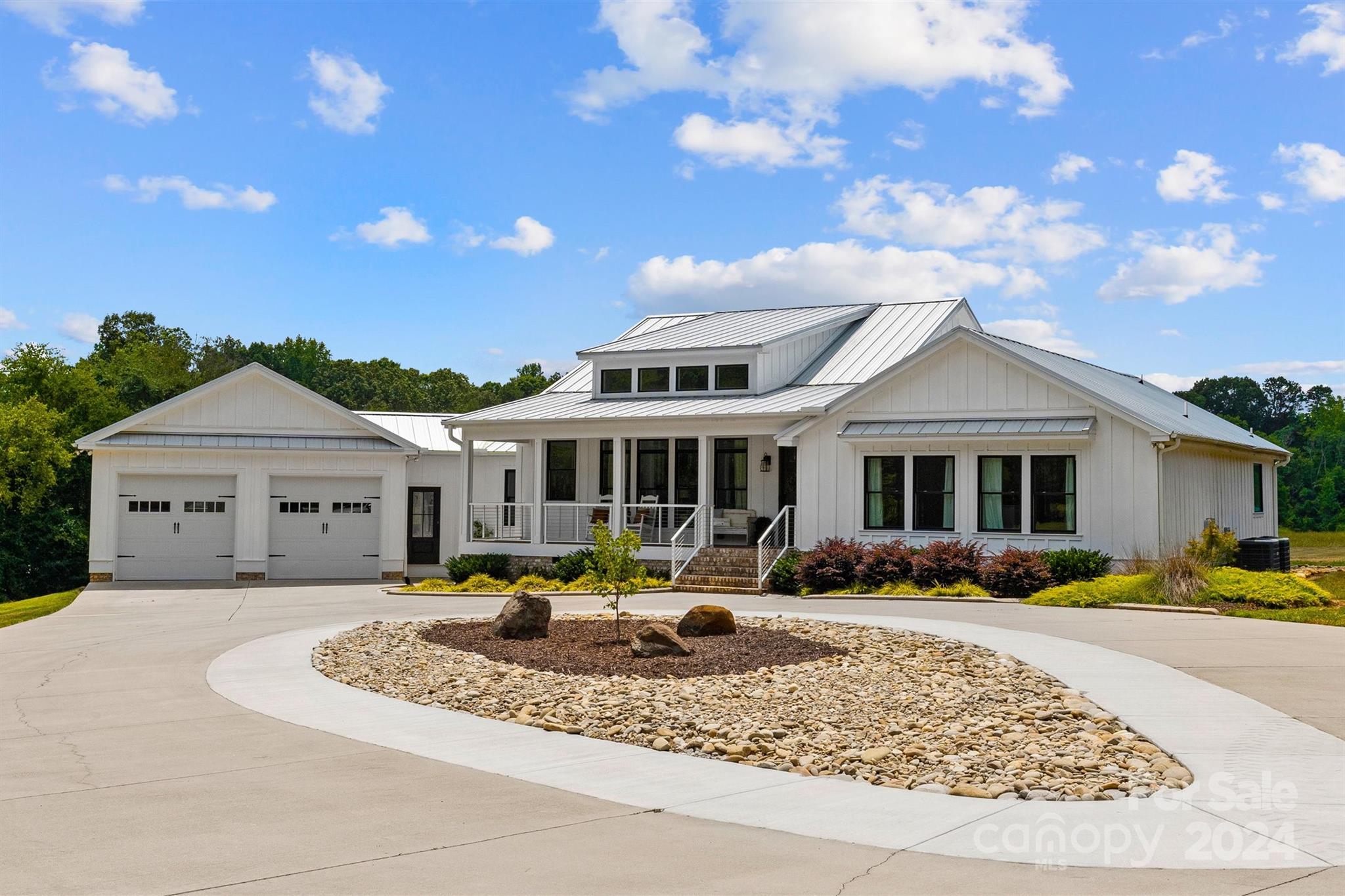 7755 Stokes Ferry Road Salisbury, NC 28146 - Photo 29 of 47 a front view of a house with a yard