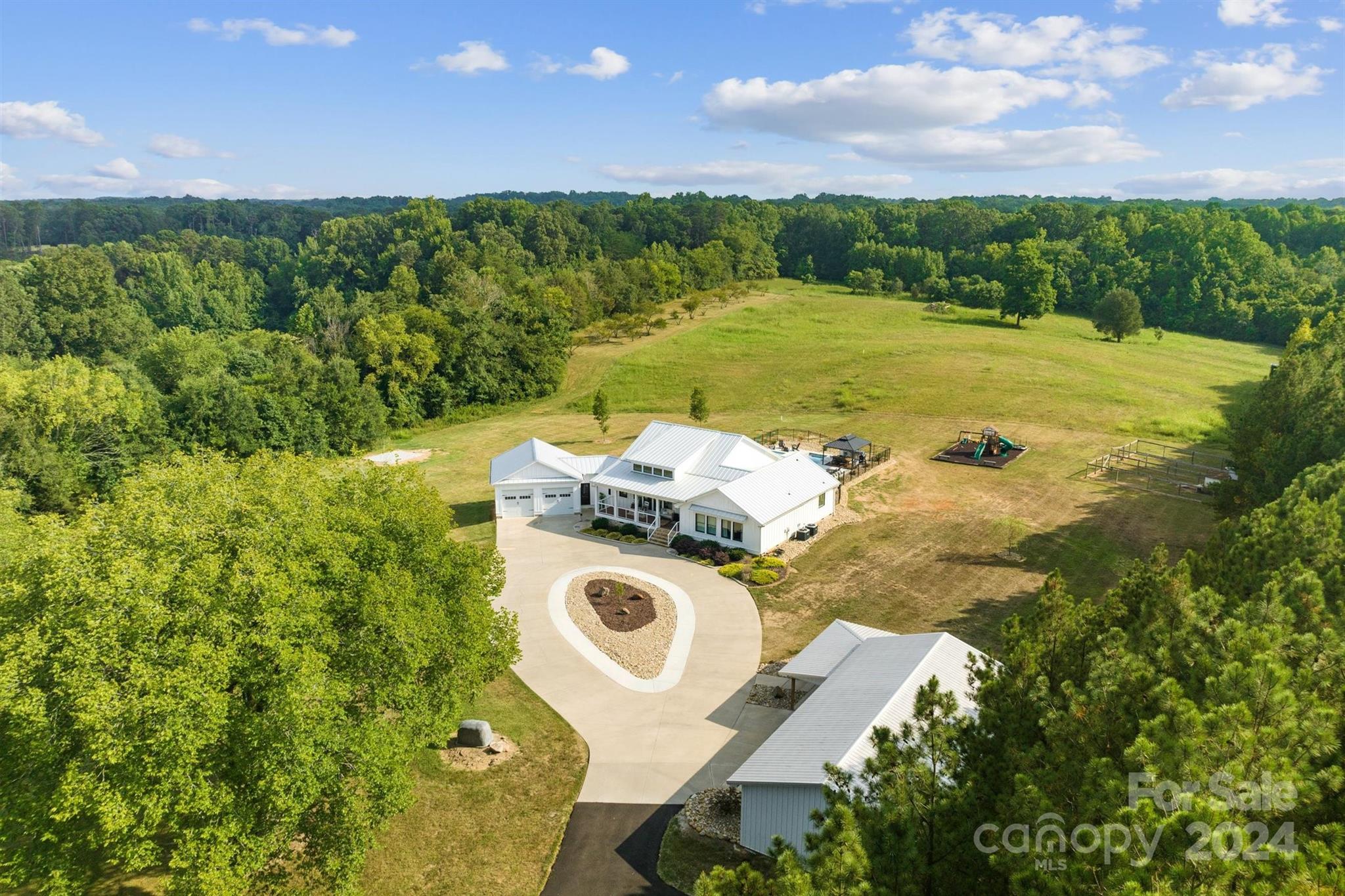 7755 Stokes Ferry Road Salisbury, NC 28146 - Photo 42 of 47 a view of a lake with top