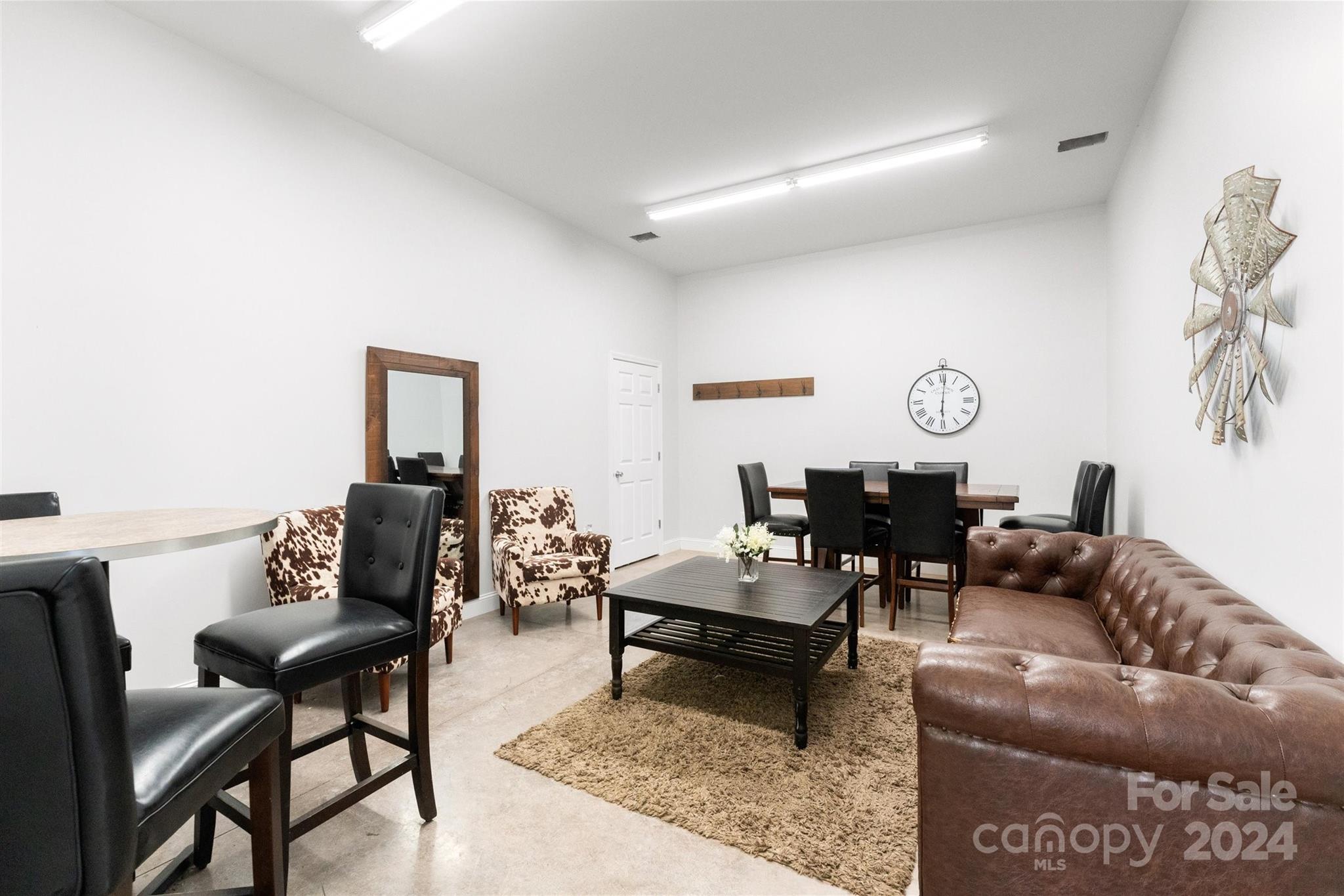 7755 Stokes Ferry Road Salisbury, NC 28146 - Photo 45 of 47 a living room with furniture