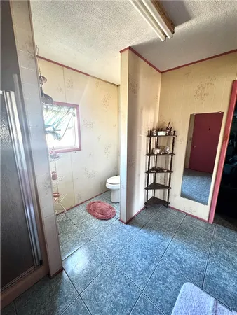 a view of room with window and hardwood floor