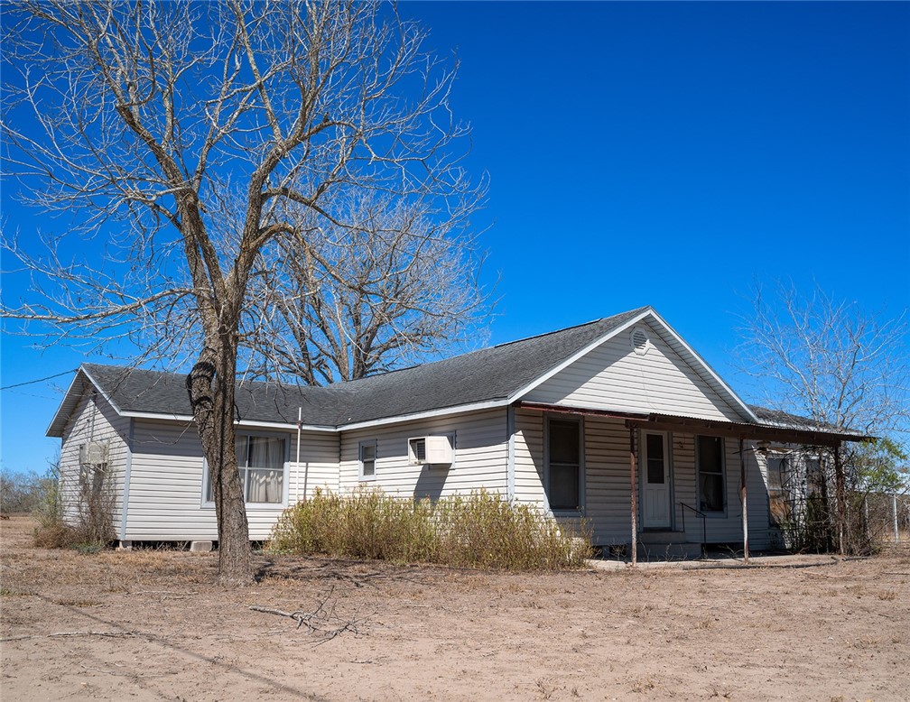 1580 Middle George West, TX 78022 - Photo 2 of 15 a front view of a house with a yard