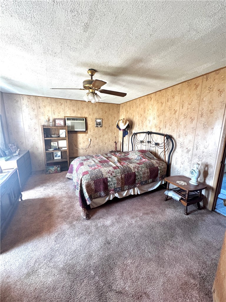 1580 Middle George West, TX 78022 - Photo 8 of 15 a bedroom with bed and a large window
