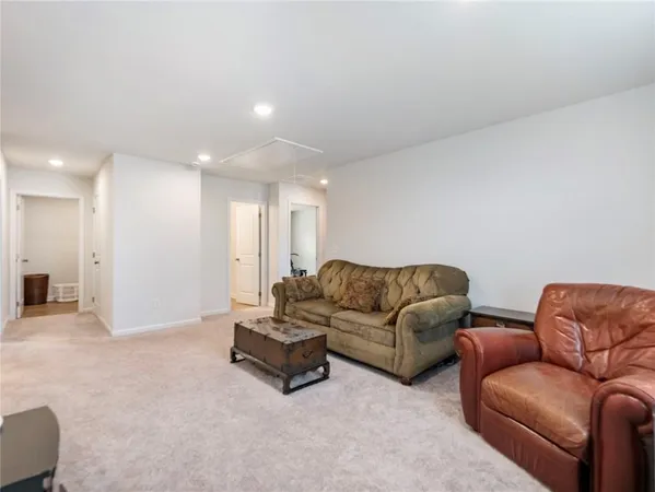 a bedroom with a bed and a mirror