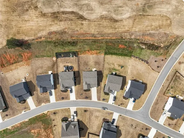 a view of swimming pool with outdoor seating