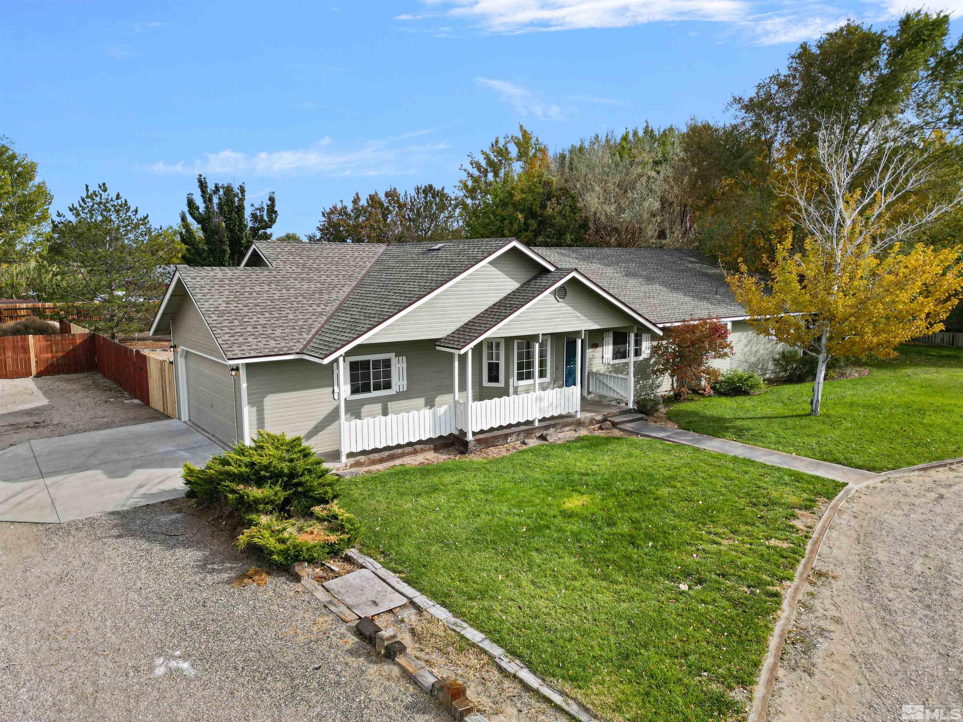4046 Cimarron Road Fallon, NV 89406 - Photo 3 of 30 a front view of a house with a yard