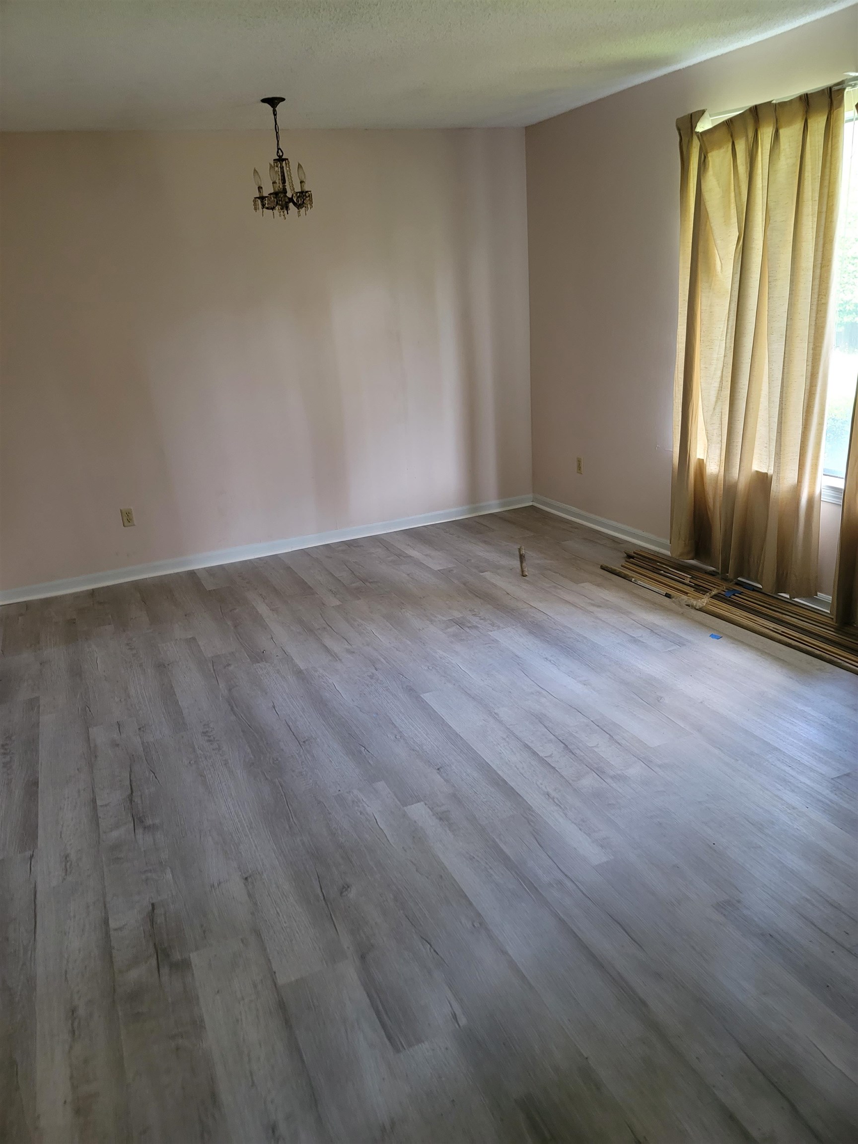 5252 Johns River Road, Unit 5252 Memphis, TN 38116 - Photo 2 of 12 wooden floor in an empty room