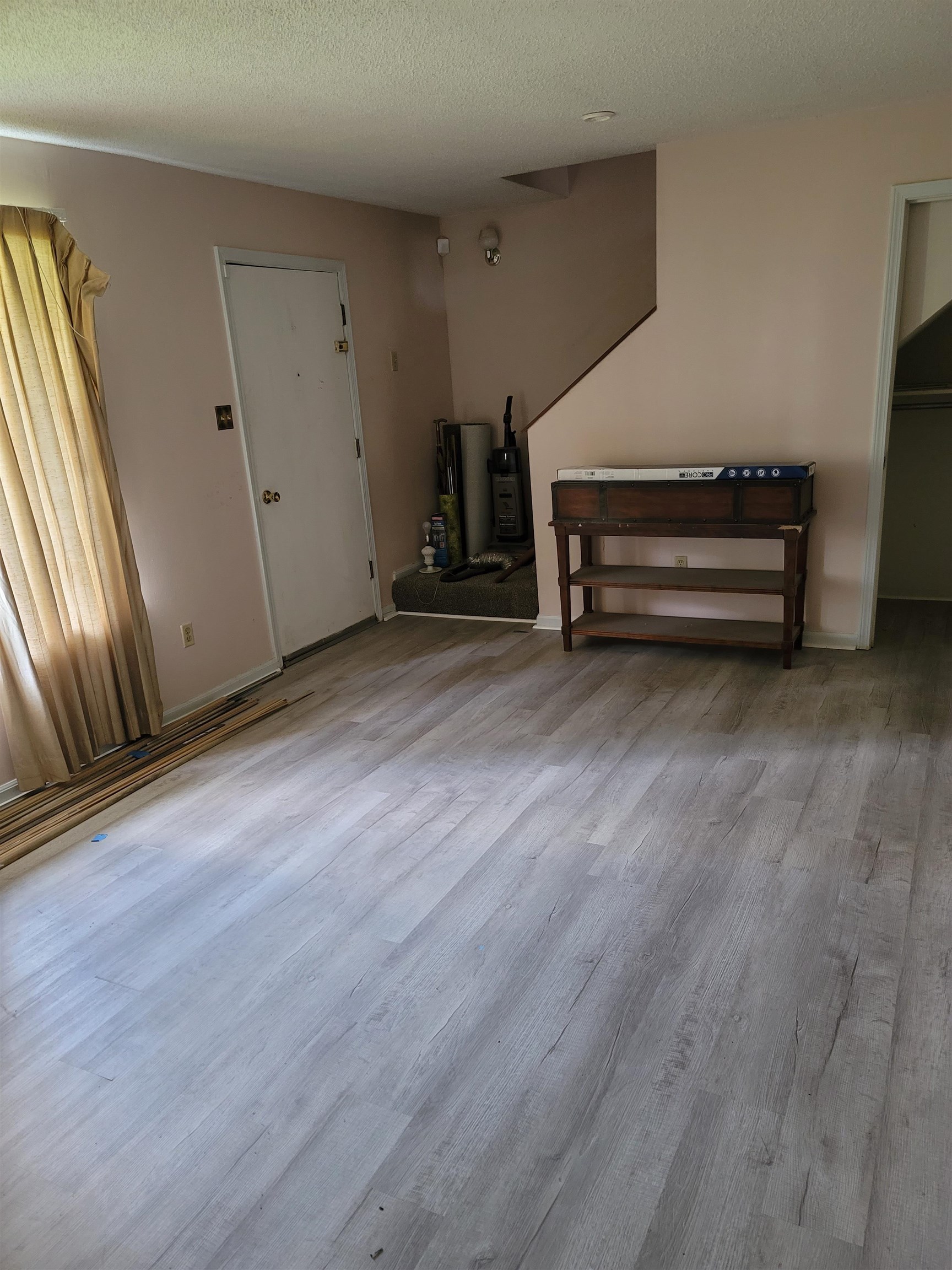 5252 Johns River Road, Unit 5252 Memphis, TN 38116 - Photo 5 of 12 a view of room with wooden floor and window