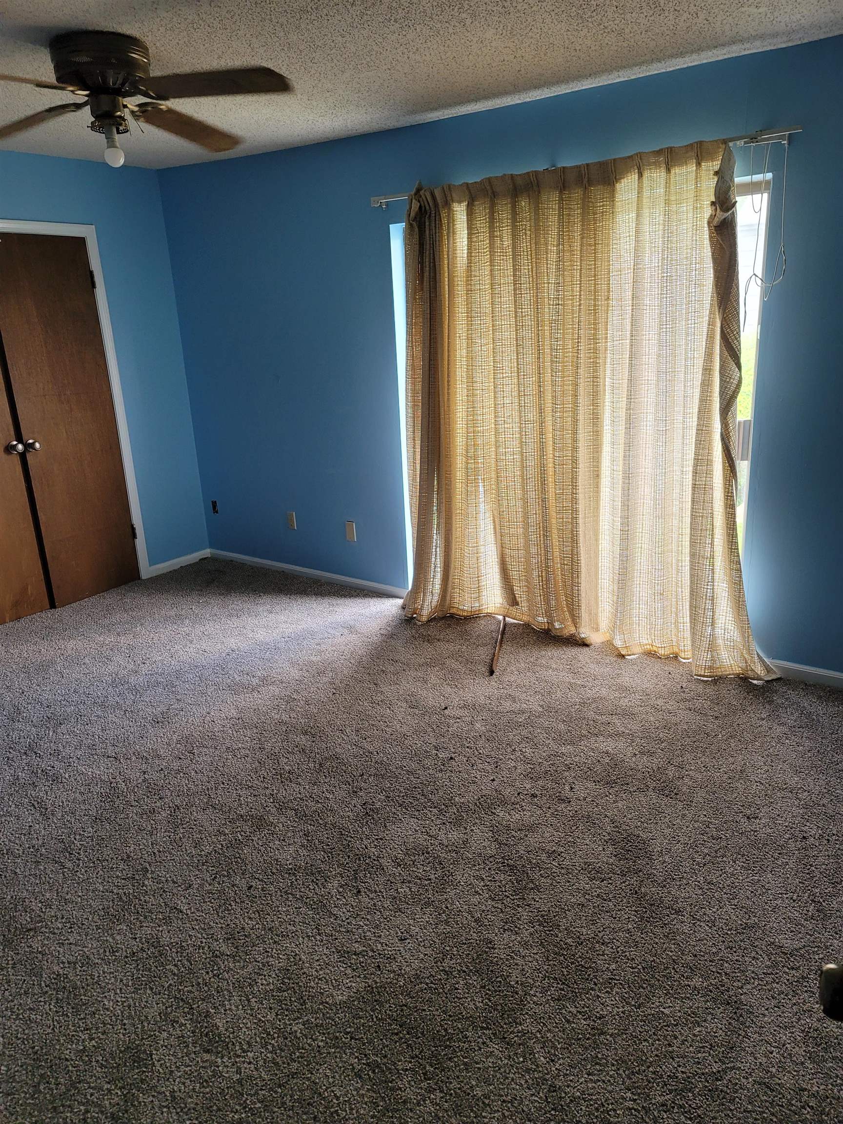 5252 Johns River Road, Unit 5252 Memphis, TN 38116 - Photo 9 of 12 an empty room with windows