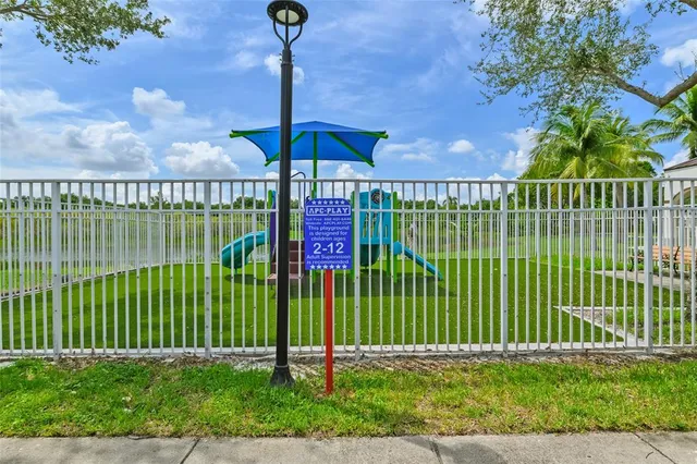 a view of a backyard with a garden