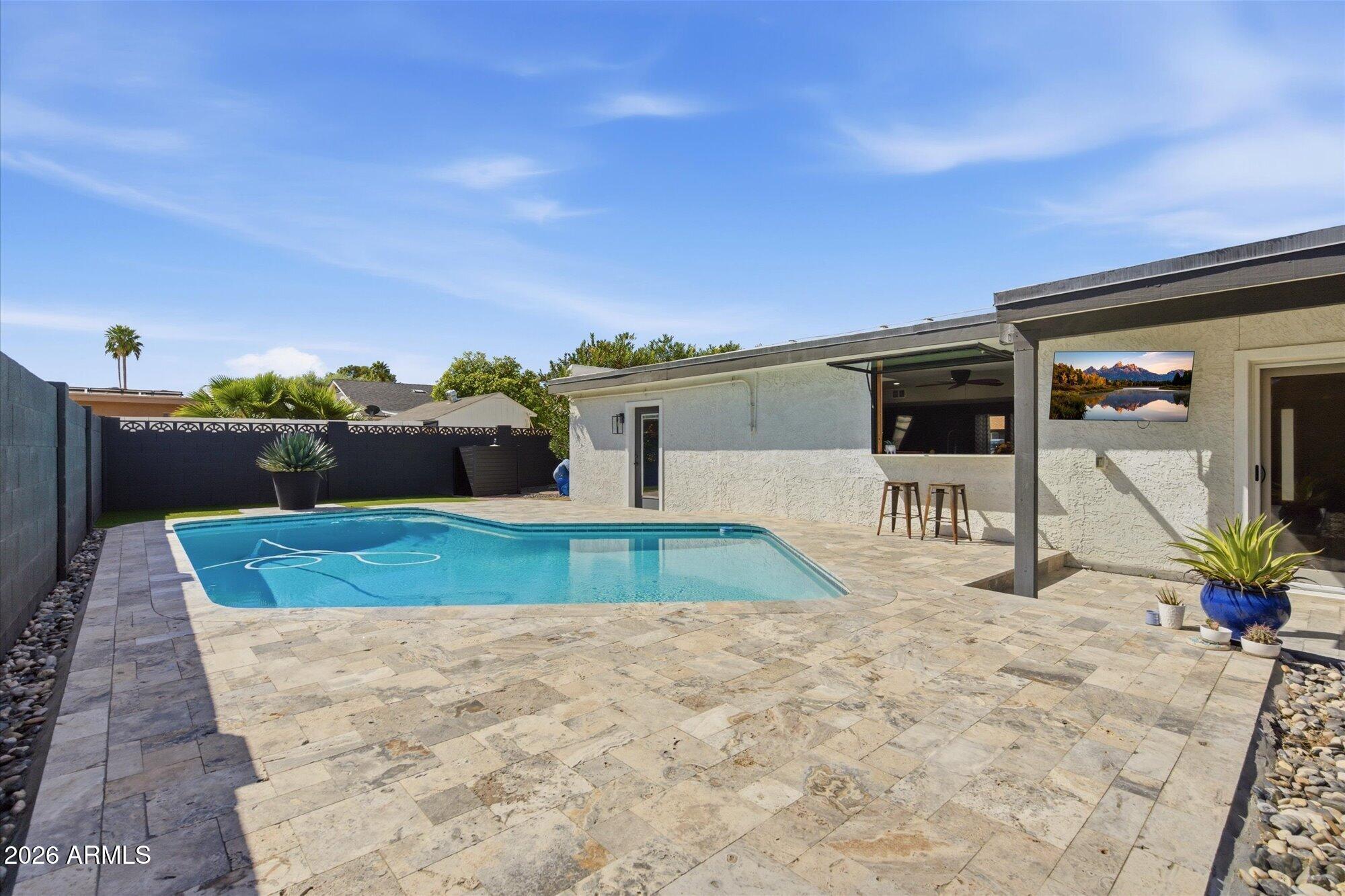 10245 North 34th Place Phoenix, AZ 85028 - Photo 22 of 27 Travertine around pool deck