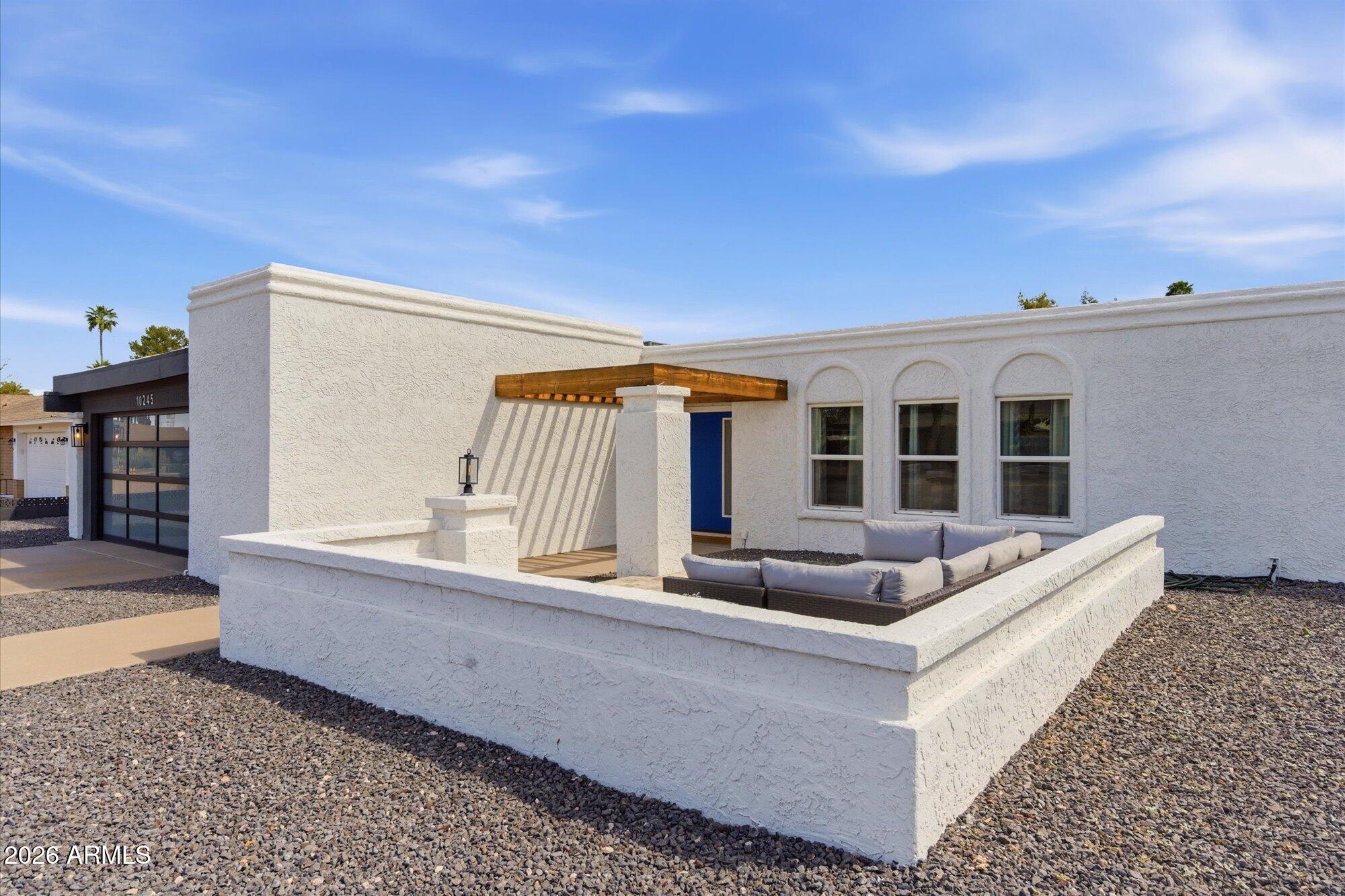 10245 North 34th Place Phoenix, AZ 85028 - Photo 25 of 27 Front Travertine Paved Patio