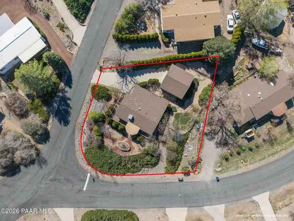 an aerial view of a house with a garden
