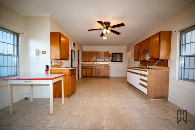 a kitchen with a cabinets and counter space