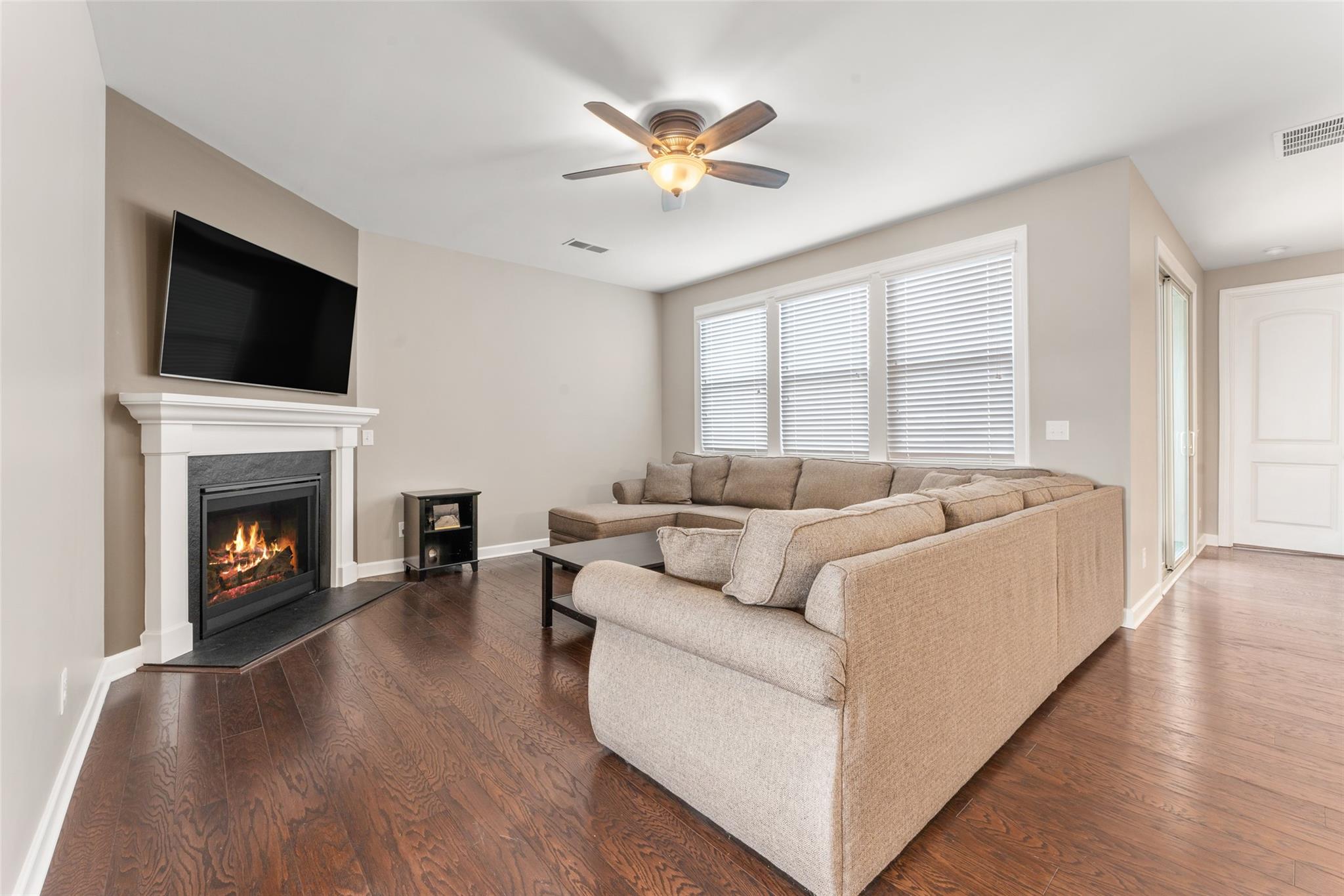 1288 Independence Street Tega Cay, SC 29708 - Photo 14 of 37 a living room with furniture fireplace and flat screen tv