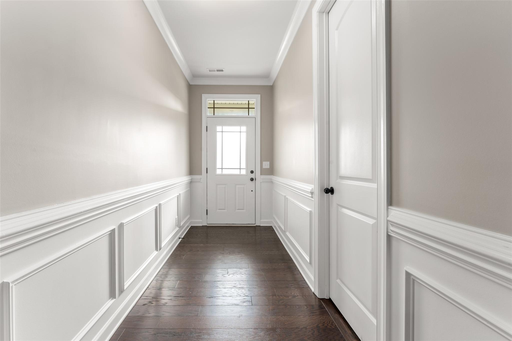 1288 Independence Street Tega Cay, SC 29708 - Photo 5 of 37 a view of a hallway with wooden floor