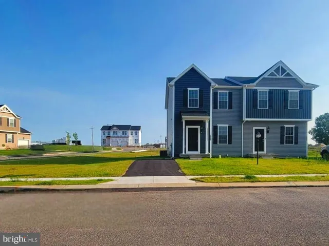 a front view of a house with swimming pool