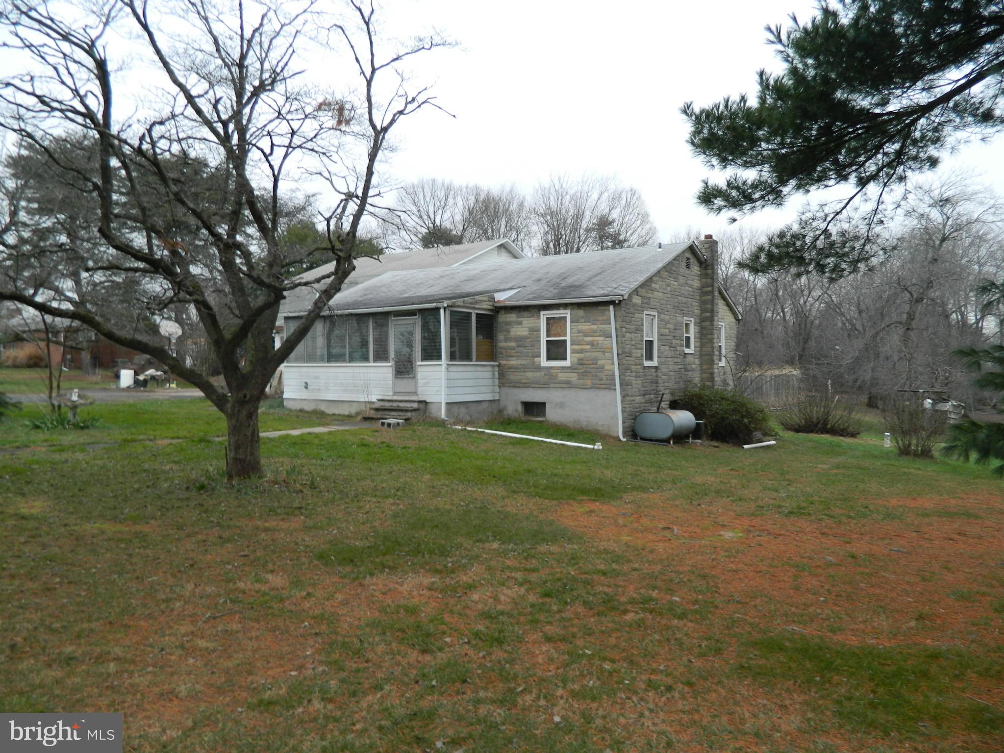 5708 Hilltop Road Baltimore, MD 21220 - Photo 3 of 10 a view of a yard in front of house