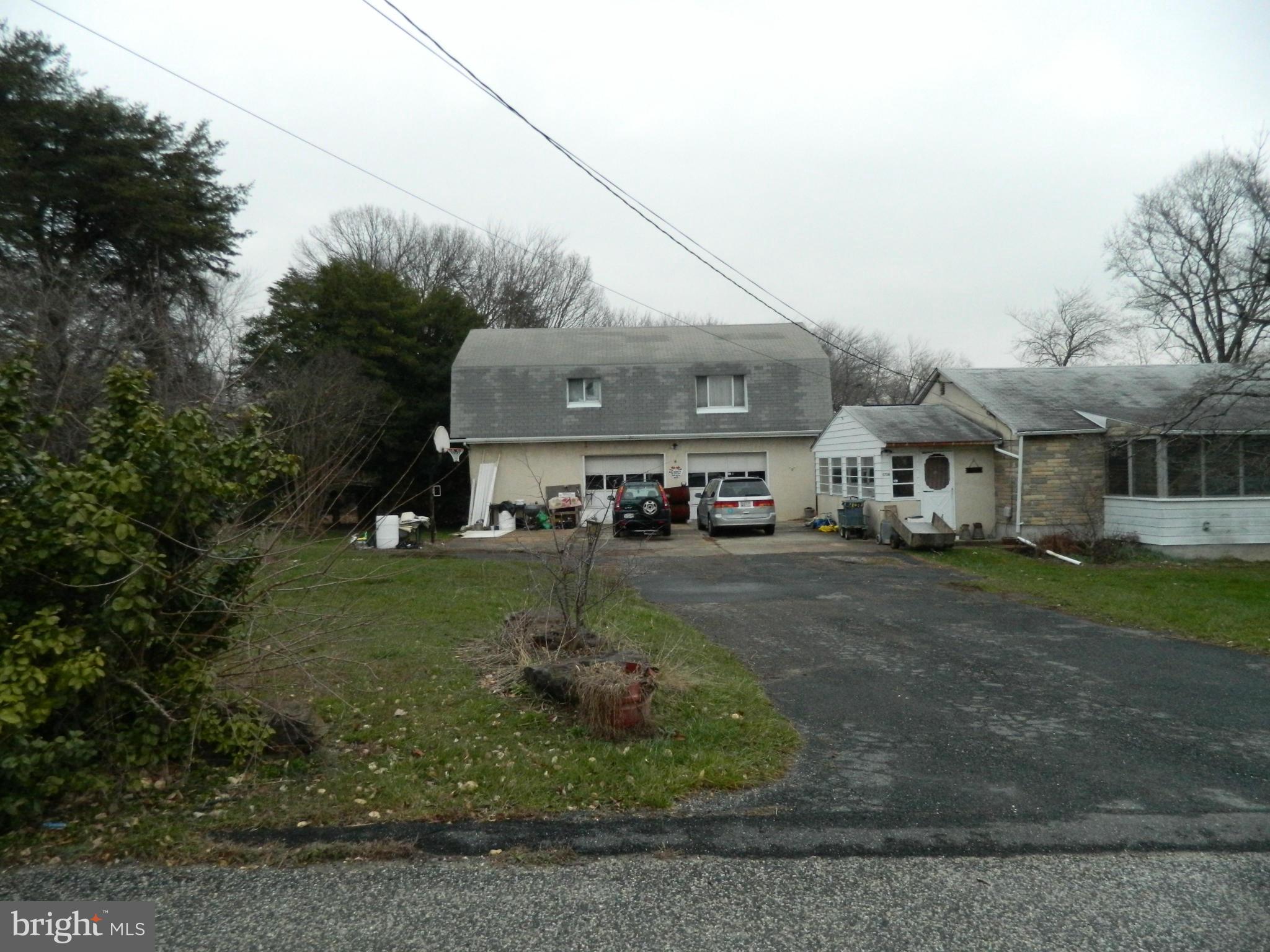 5708 Hilltop Road Baltimore, MD 21220 - Photo 7 of 10 a view of a town with barn house in the background