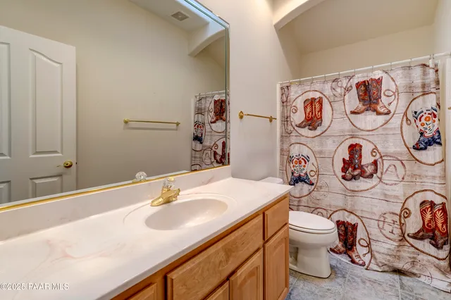 an aerial view of a house with a garden