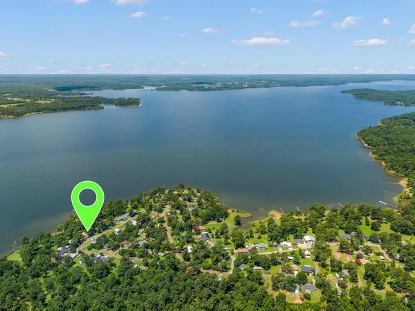 a view of a lake from a yard
