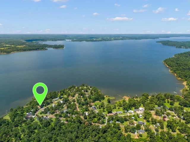 a view of a lake from a yard