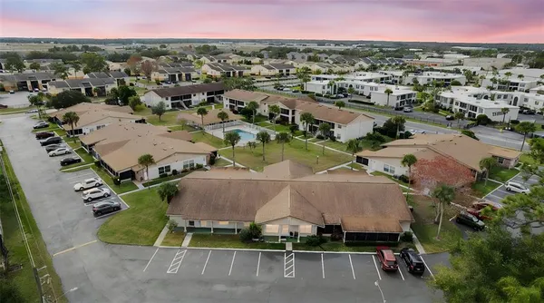 an aerial view of a house with a garden