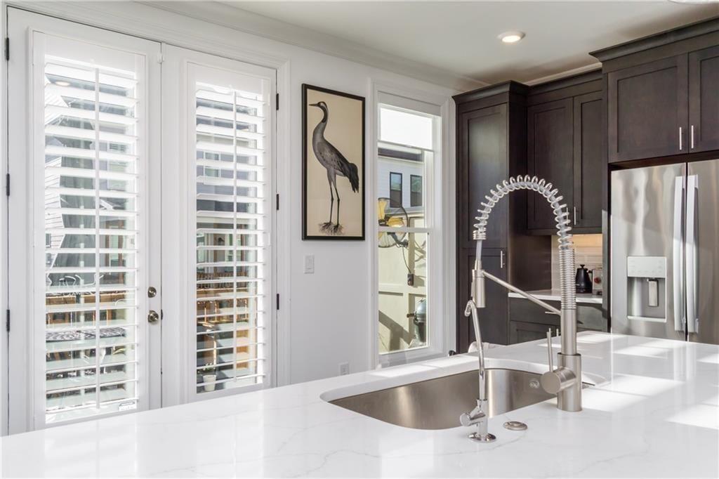 3106 Moor View Road Duluth, GA 30096 - Photo 13 of 57 a kitchen with a sink and a window
