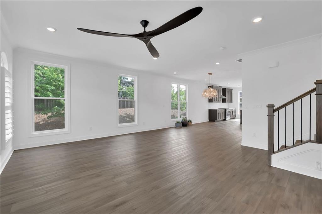 3106 Moor View Road Duluth, GA 30096 - Photo 27 of 57 a view of an empty room with wooden floor and a window
