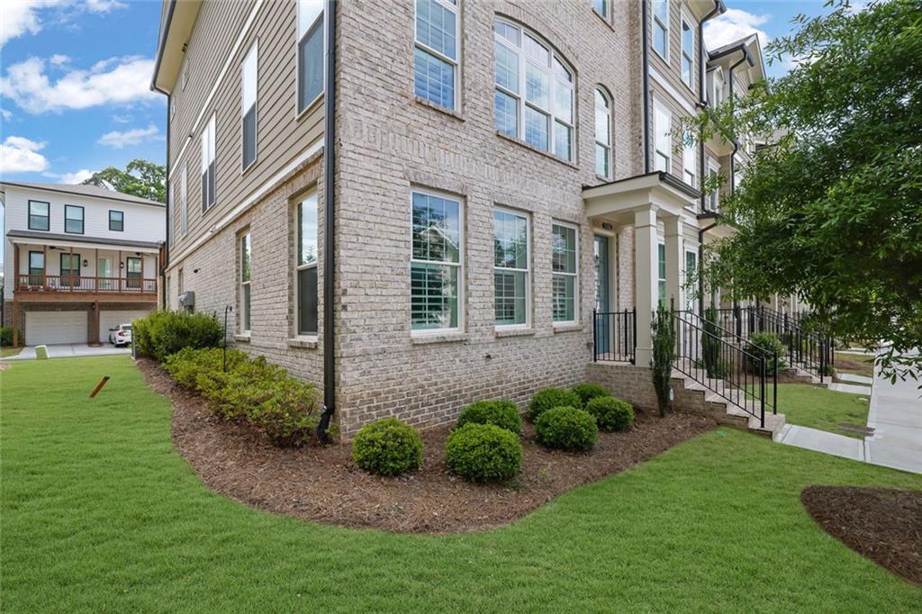 3106 Moor View Road Duluth, GA 30096 - Photo 47 of 57 a view of a building with a garden